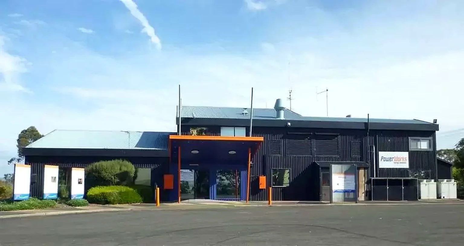 PowerWorks Energy Education Centre beneath a blue sky.